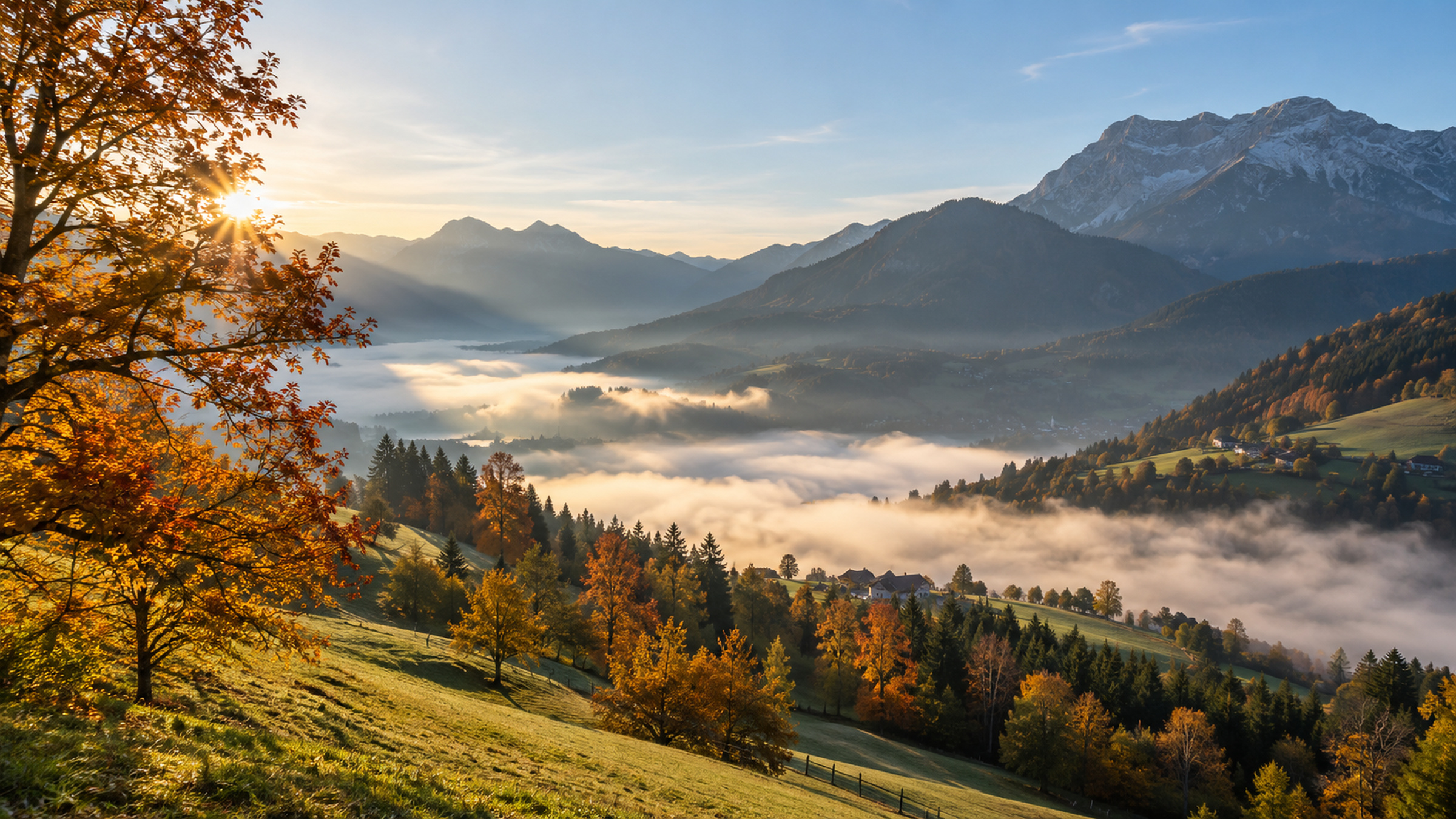 Herbstmorgen in der Schweiz mit Nebelfeldern in den Tälern und sonnigen Bergen.